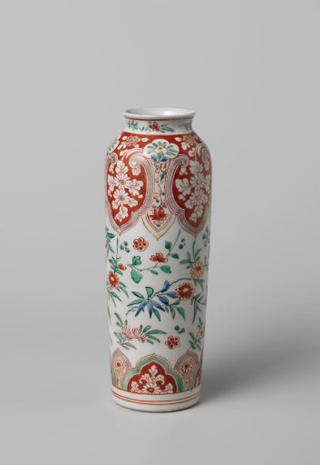 Cilindrical vase with flower sprays and scrolls in shaped panels