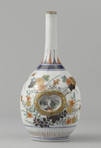 Bottle with two recessed panels with flower sprays and chickens in relief