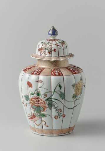 Lobed covered jar with two bouquets and flower scrolls