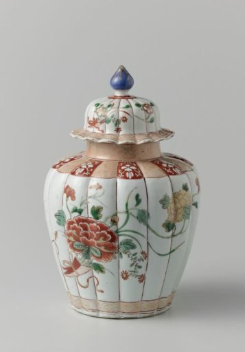 Lobed covered jar with two bouquets and flower scrolls