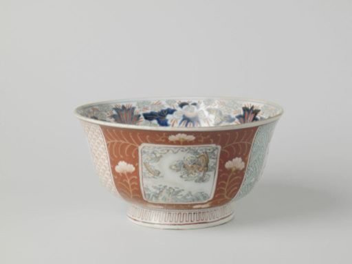 Bowl with floral scrolls, prunus trees and dragons in panels and diaper patterns