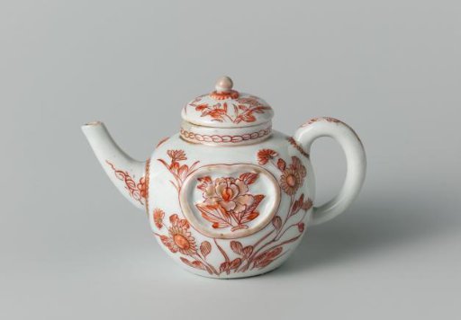 Tea pot with flowering plants, a cock and a chicken