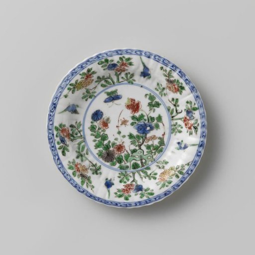 Fluted saucer with rocks, flower sprays and birds