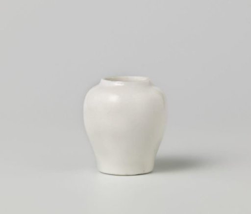 Small, baluster vase with lightly incised flower spray