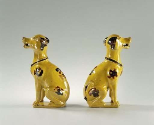 Figure of a seated dog with spots and collar