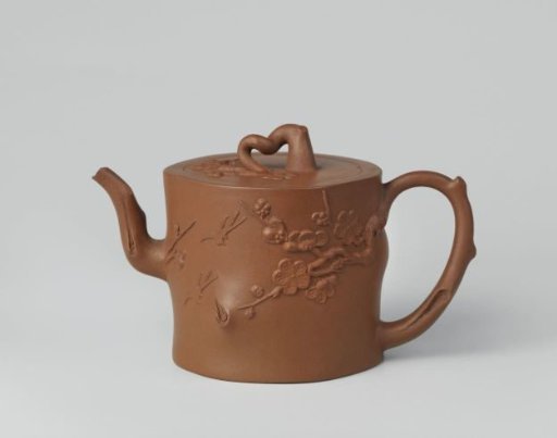 Teapot with prunus sprays, birds and a butterfly