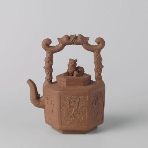 Hexagonal tea pot with a figure on a dragon's head amid waves
