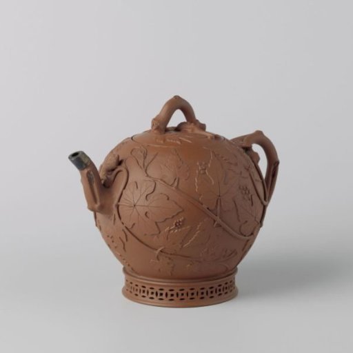 Teapot with grapevines and squirrels