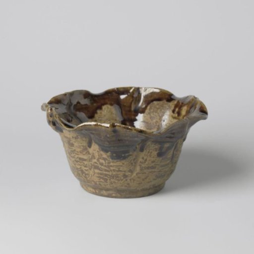 Bowl with a scalloped rim and green glaze
