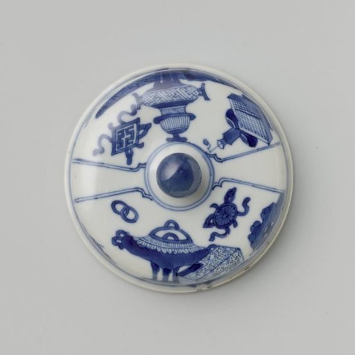 Cylindrical covered jar on foot with precious objects and antiquities