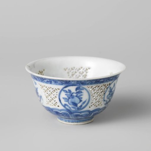 Bell-shaped bowl with pierced sides and flower sprays in medallions