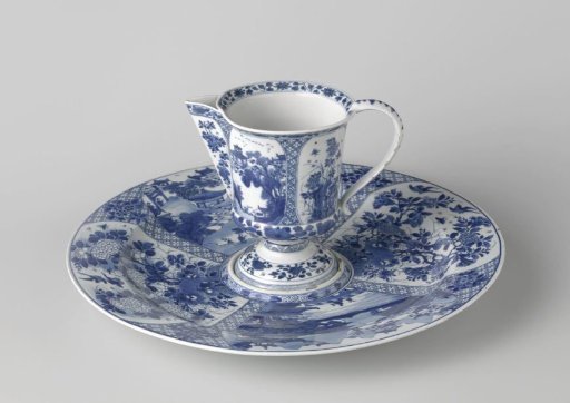 Ewer with landscapes and flowering plants in panels