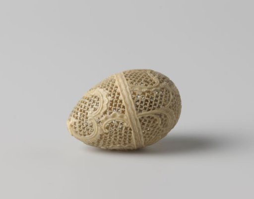 Ivory box in the shape of an egg with an openwork wall