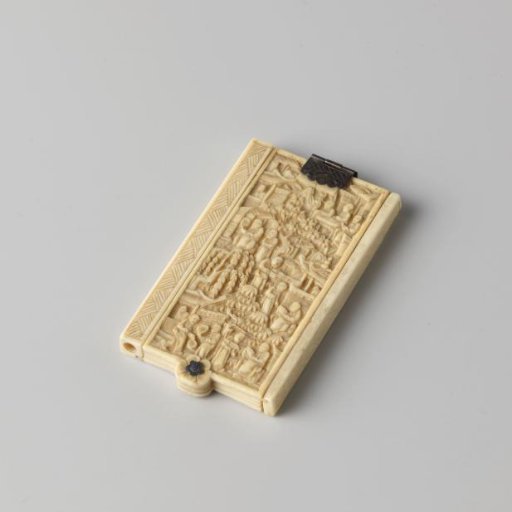 Ivory notebook with five leaves, a carved binding and silver clasp