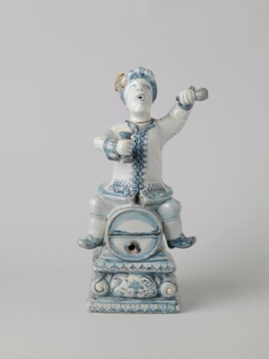 Spirit keg in the shape of a Dutchman sitting astride a barrel