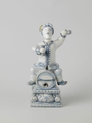 Spirit keg in the shape of a Dutchman sitting astride a barrel