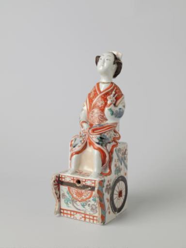 Spirit keg in the shape of a Japanese woman on a chariot
