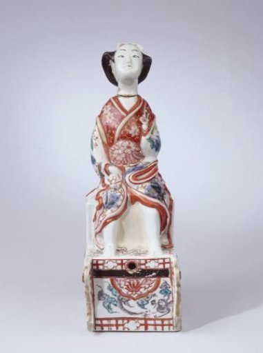 Spirit keg in the shape of a Japanese woman on a chariot