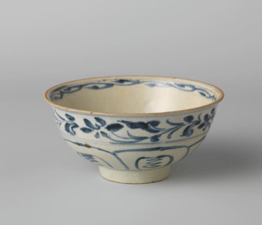 Bell-shaped bowl with a flower spray and floral scrolls