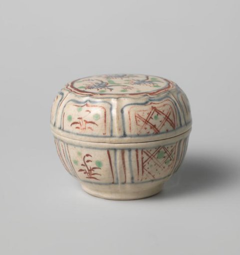Box with diaper patterns and flowering plants in a panel decoration