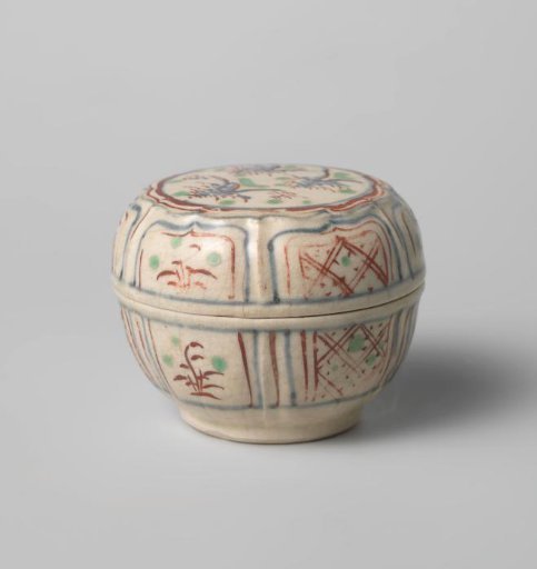 Box with diaper patterns and flowering plants in a panel decoration