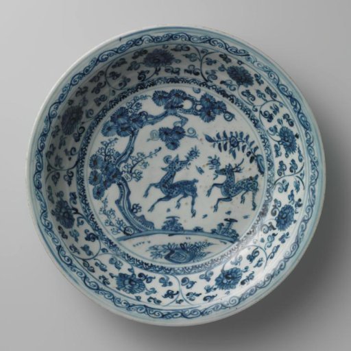 Dish with two deer in a landscape