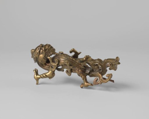 Handle of yellow copper from a pilgrim's vase