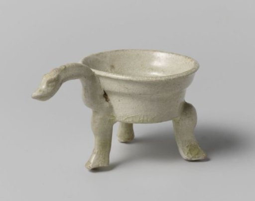 Bowl with three legs and the handle in the shape of a dragons head