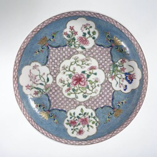 Saucer-dish with flower sprays in shaped panels on a diaper-pattern ground