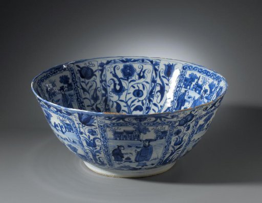 Bowl with a woman with a reel, flowering plants and figures in landscapes in a panel decoration