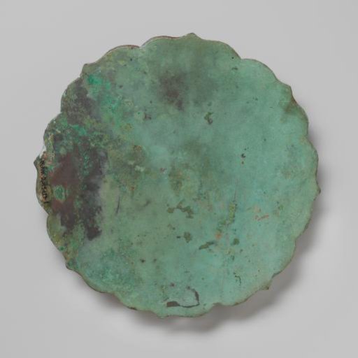 Bronze mirror depicting sea waves and a boat with inscription