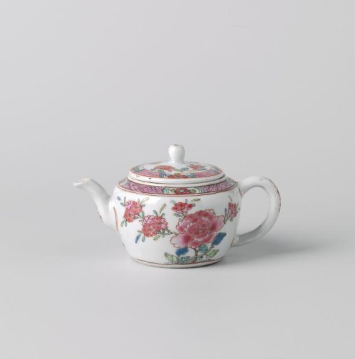 Tea pot with flowering plants and diaper patterns