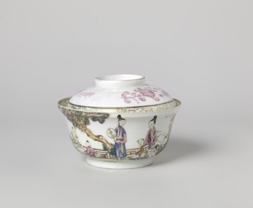 Covered cup with two women and three boys in a fenced garden