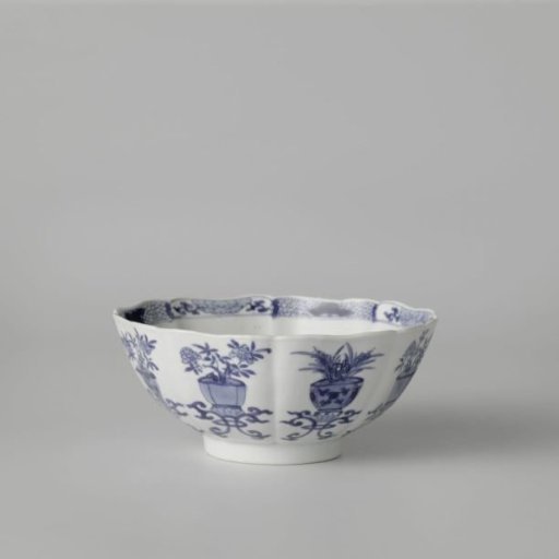 Bowl with moulded panels with flower pot and lotus scrolls