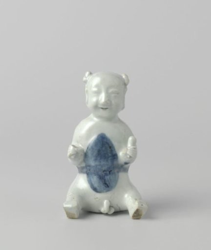 Figure of a seated boy