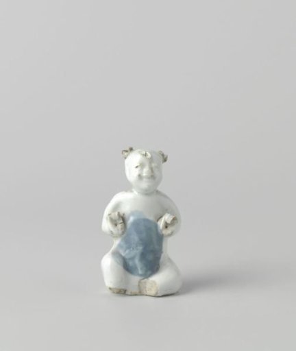 Figure of a seated boy
