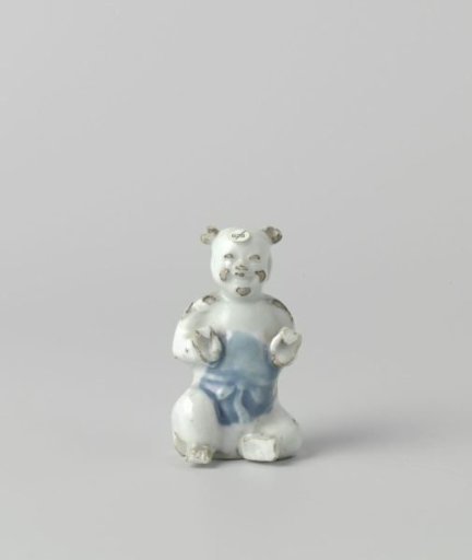 Figure of a seated boy