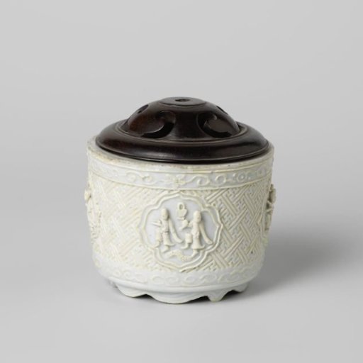 Incense burner with moulded figures and a wooden cover