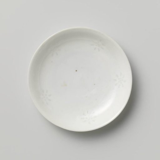 Saucer with translucent rice-grain roundels