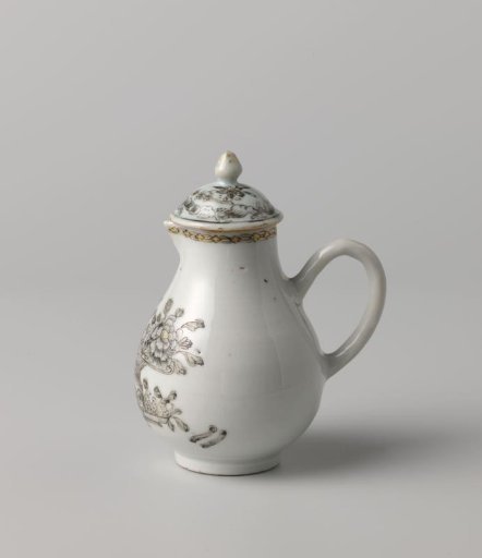 Pear-shaped milk jug with a flower and fruit basket