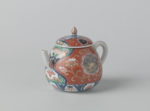 Teapot with lotus scrolls and flower roundels