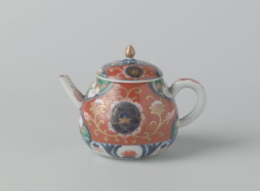 Teapot with lotus scrolls and flower roundels