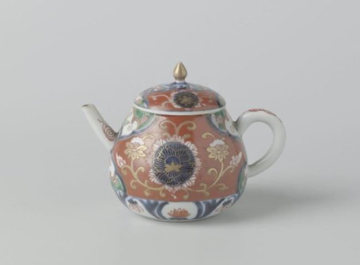 Teapot with lotus scrolls and flower roundels