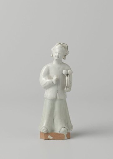 Figure of a woman holding fruit