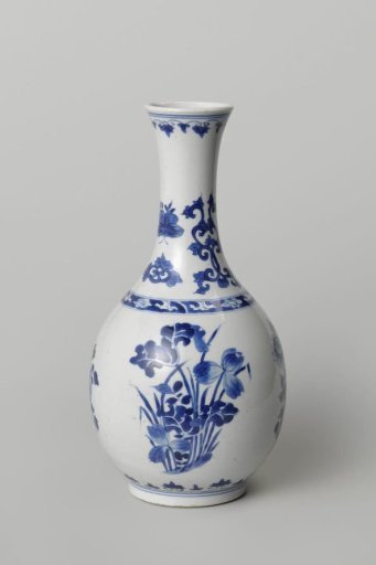 Pear-shaped bottle vase with flowering plants