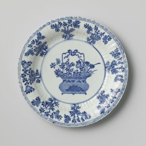 Dish with fluted sides, flower basket and flower sprays