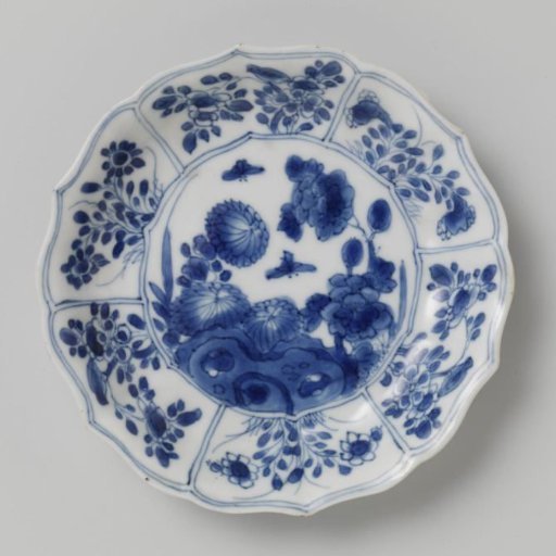 Saucer with rocks, flower sprays and butterflies