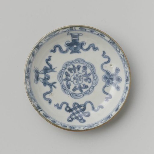 Saucer with a flower rosette and symbolic objects
