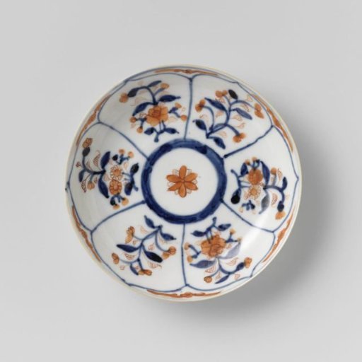 Saucer with petal-shaped panel around a central medallion, filled with flower sprays