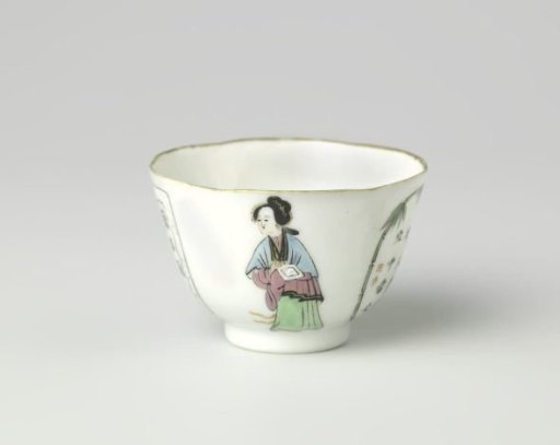 Cup with a man, woman and two panels with characters
